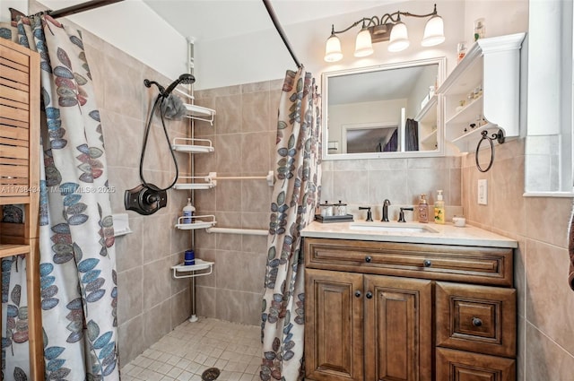 bathroom featuring a shower with curtain and tile walls