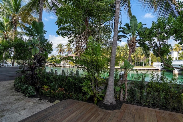 wooden terrace with a water view