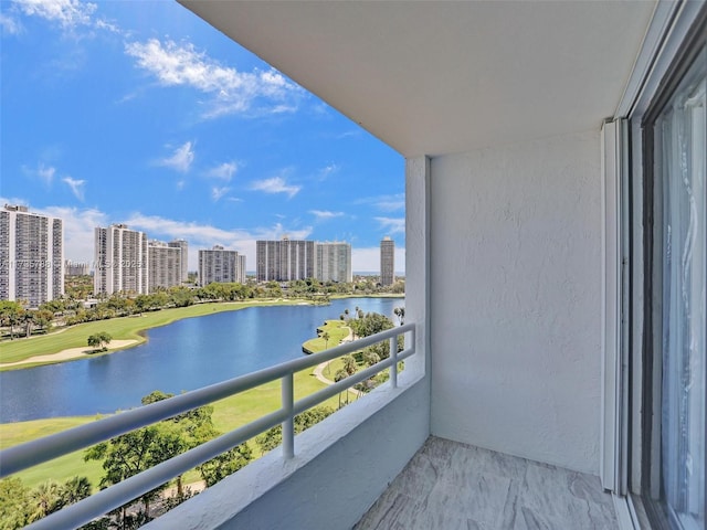 balcony featuring a water view