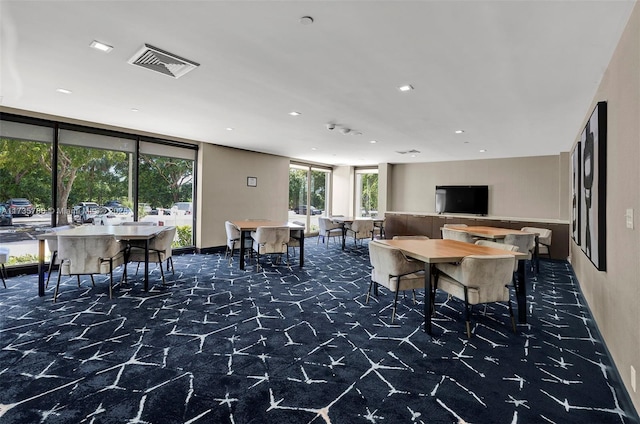 dining area featuring carpet floors