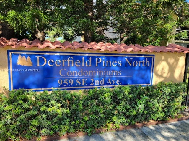 view of community sign