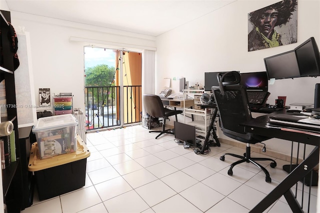 office space featuring crown molding and tile patterned flooring