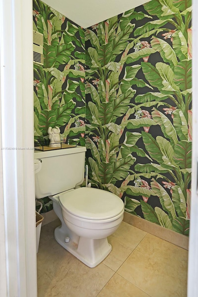 bathroom with tile patterned floors and toilet