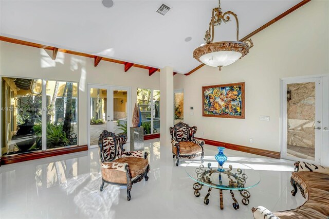 living room featuring crown molding, ceiling fan, a raised ceiling, and french doors