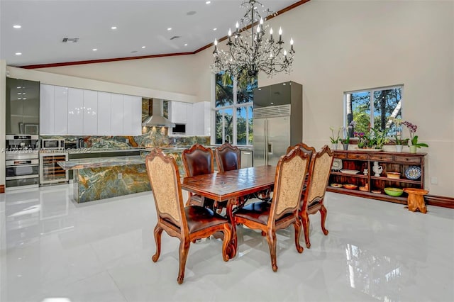 dining space with wine cooler, recessed lighting, visible vents, and high vaulted ceiling