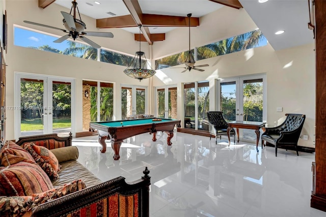 game room featuring french doors, beamed ceiling, and a ceiling fan