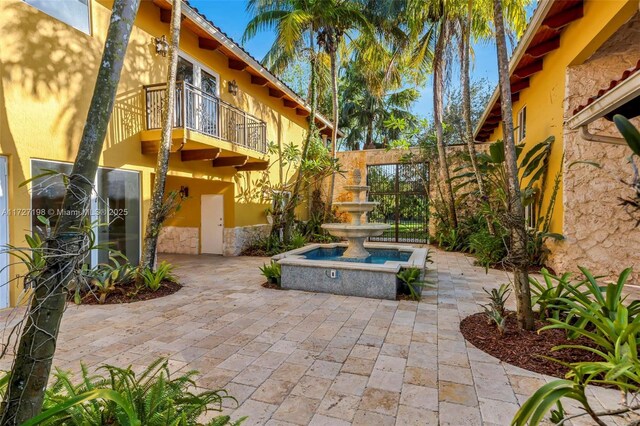 view of swimming pool featuring an outdoor living space, a gazebo, and a yard