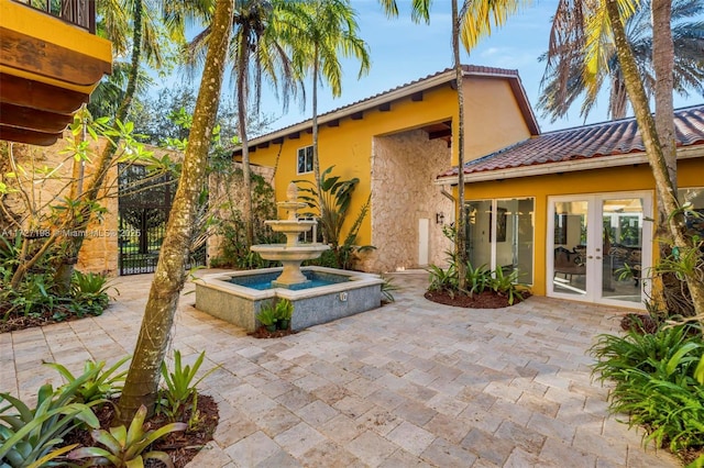 view of patio featuring french doors