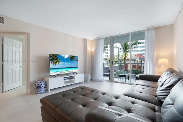 living room with floor to ceiling windows