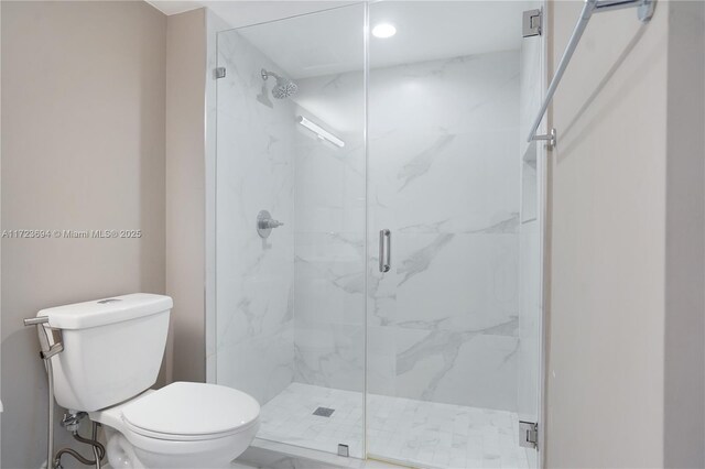 1155 Brickell Bay Dr Unit 704, Miami, FL 33131 - bathroom with toilet, a marble finish shower, and recessed lighting