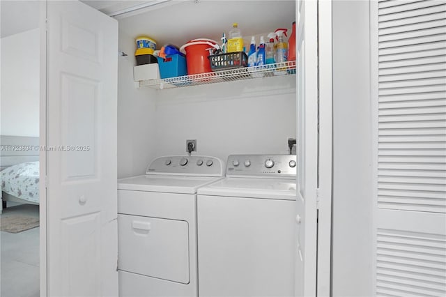 laundry area featuring independent washer and dryer