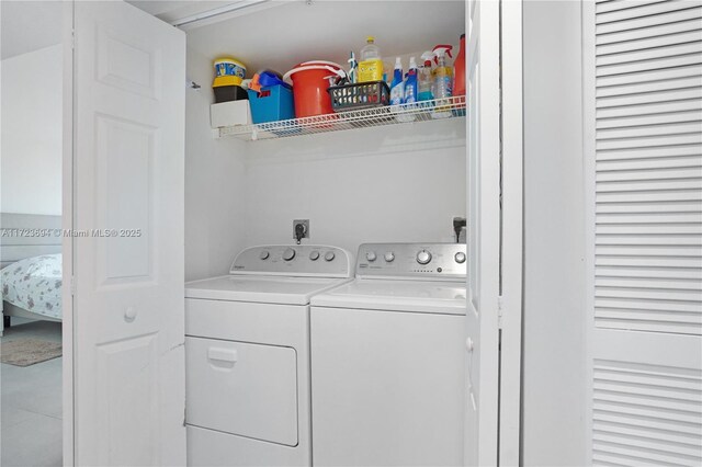 1155 Brickell Bay Dr Unit 704, Miami, FL 33131 - laundry room with washer and clothes dryer