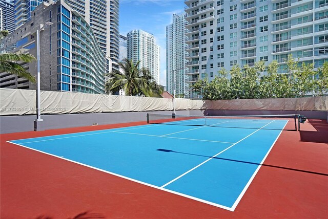 1155 Brickell Bay Dr Unit 704, Miami, FL 33131 - view of tennis court with a city view