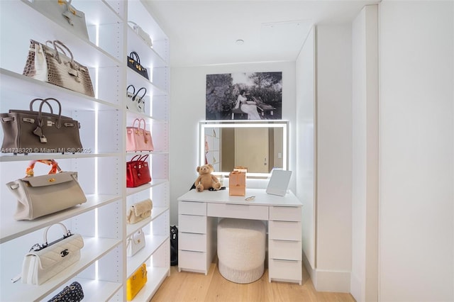 walk in closet featuring light wood-type flooring