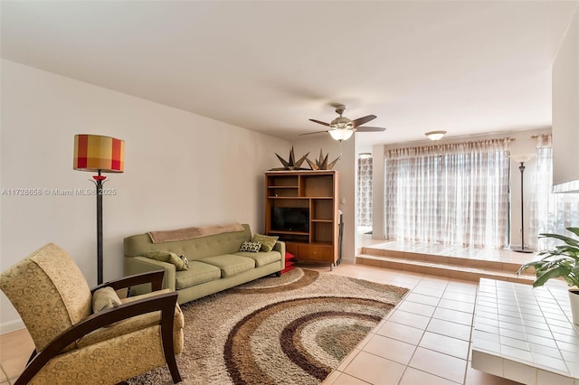 living room featuring tile patterned flooring and ceiling fan