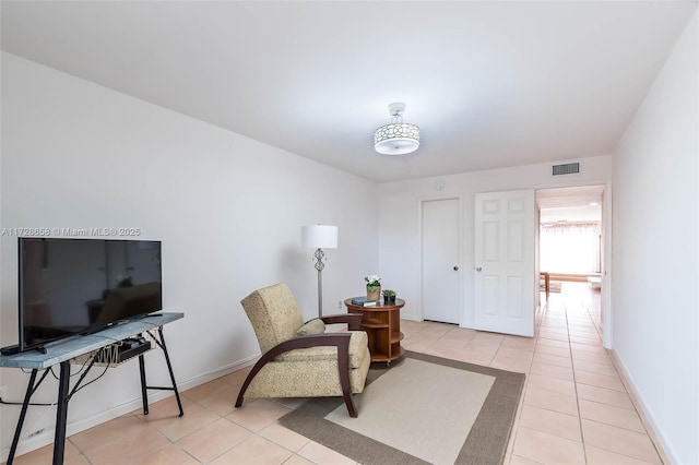 living area featuring light tile patterned floors