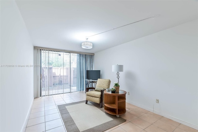 sitting room featuring light tile patterned flooring