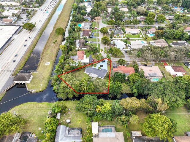 aerial view featuring a water view