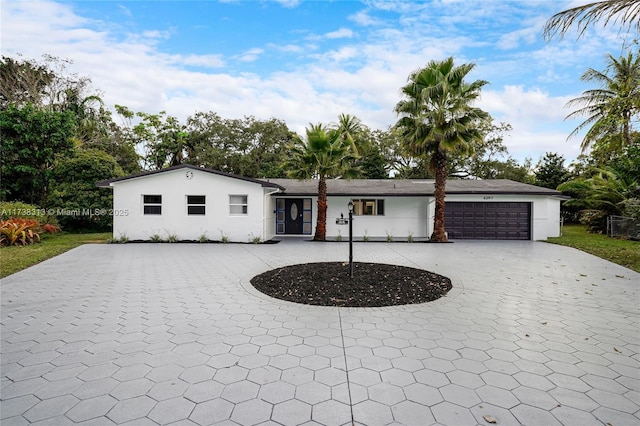 view of front of property with a garage