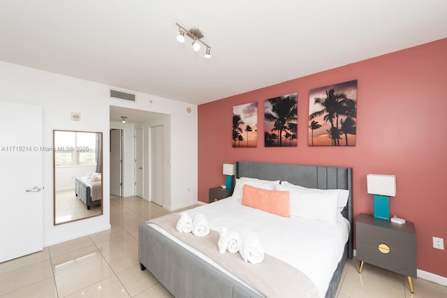 bedroom featuring tile patterned flooring