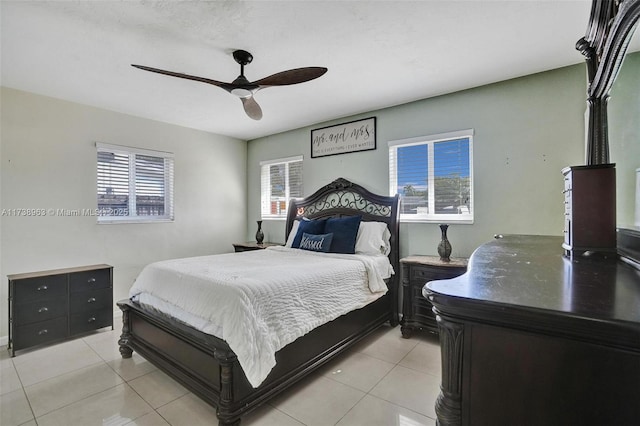 bedroom featuring light tile patterned floors and ceiling fan