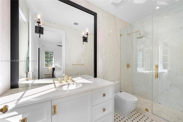 bathroom featuring walk in shower, vanity, and toilet