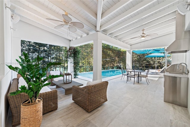 view of patio featuring outdoor lounge area, ceiling fan, an outdoor pool, and outdoor dining space