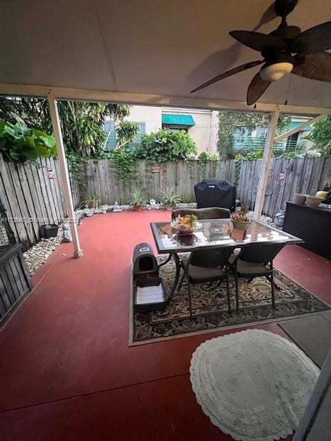 view of patio / terrace with area for grilling and ceiling fan