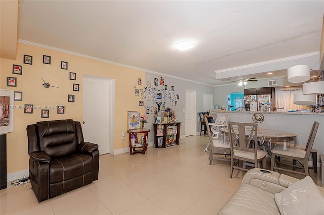 living room with light tile patterned floors, ornamental molding, and ceiling fan