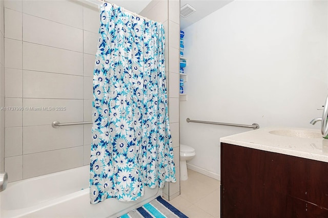 full bathroom with vanity, tile patterned floors, toilet, and shower / bath combo with shower curtain