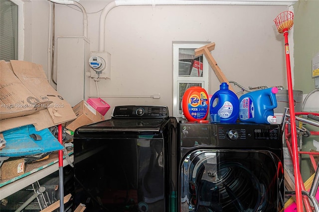 laundry area with separate washer and dryer