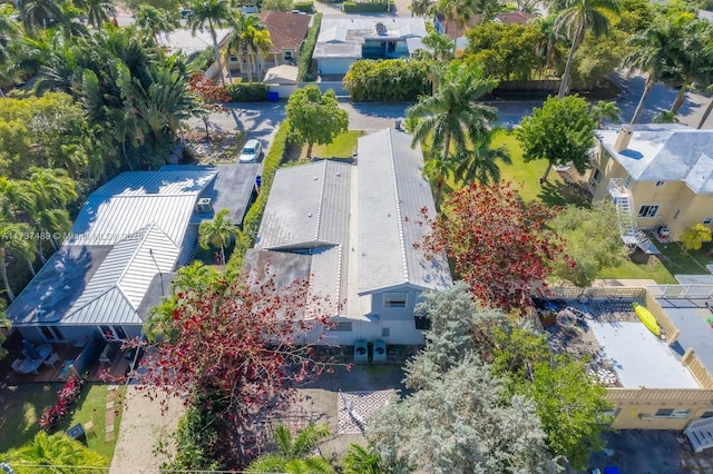 birds eye view of property with a residential view