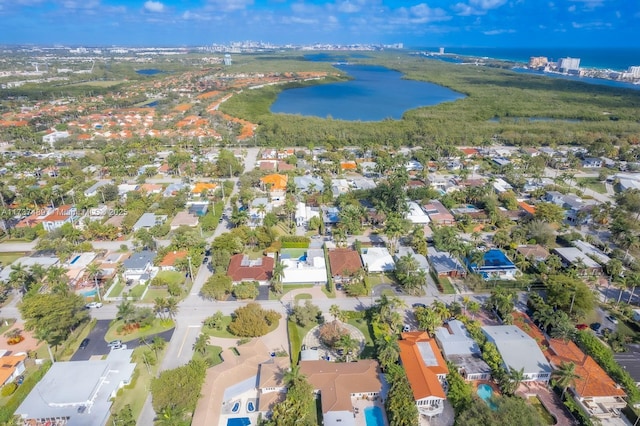 aerial view featuring a water view and a residential view