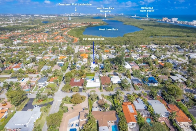 aerial view featuring a residential view and a water view