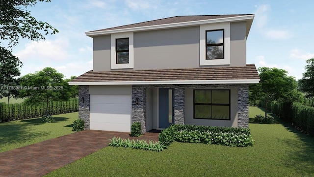 view of front of home featuring a garage and a front lawn