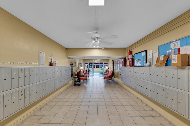 view of community featuring mail area and a ceiling fan
