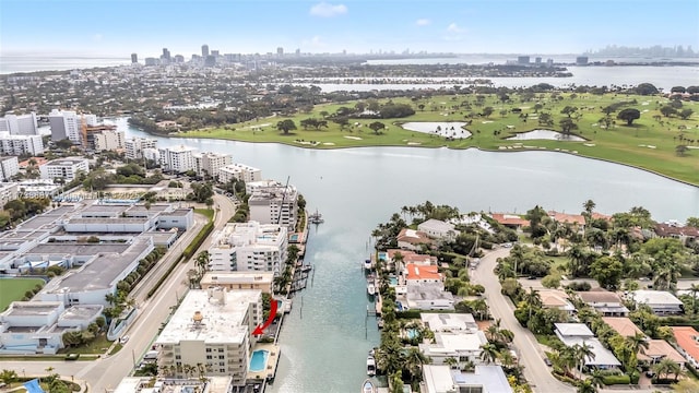 birds eye view of property featuring a water view