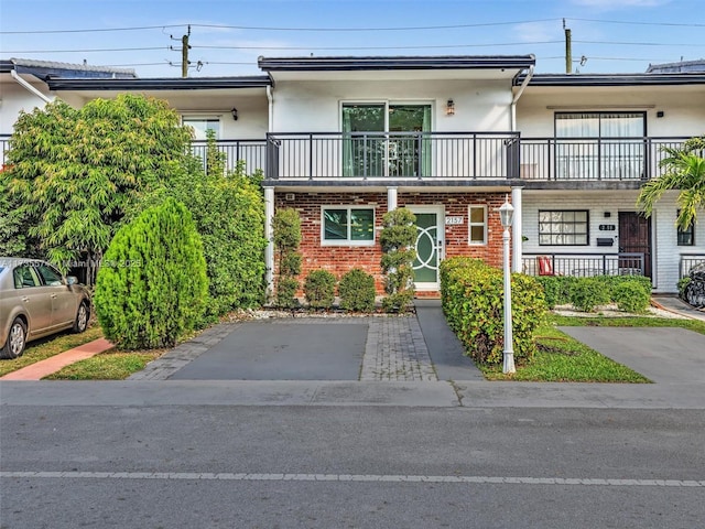 view of property featuring a balcony