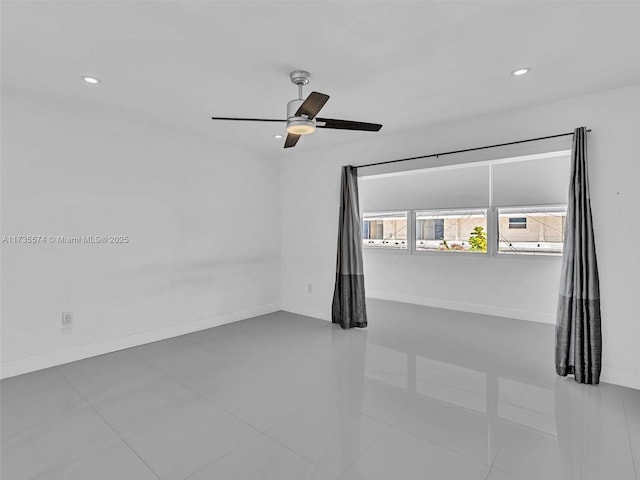 empty room featuring ceiling fan