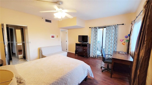 bedroom with dark hardwood / wood-style flooring and ceiling fan