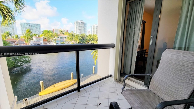 balcony featuring a water view