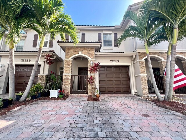 view of front of home with a garage