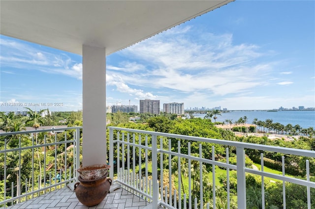 balcony featuring a water view