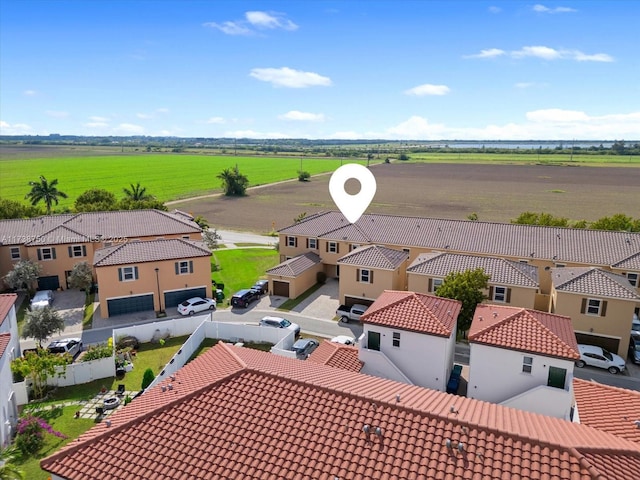 aerial view featuring a rural view and a residential view