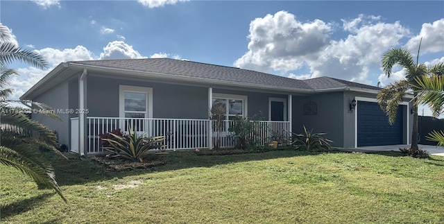 view of front facade featuring a garage and a front lawn