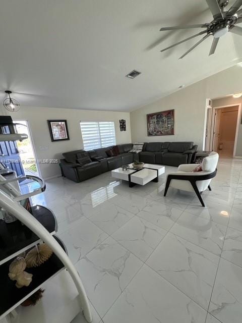 living room with lofted ceiling and ceiling fan