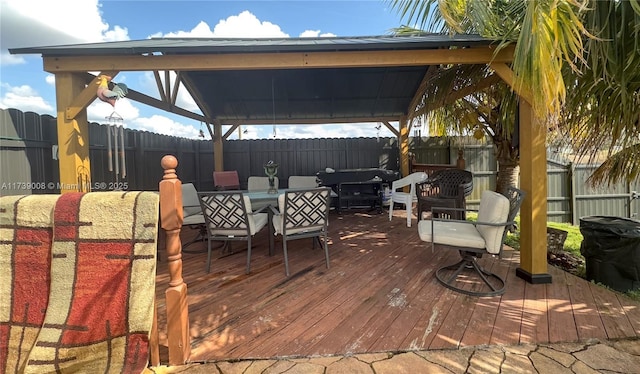 wooden deck with a gazebo