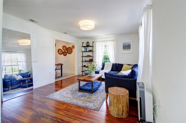 living room featuring dark hardwood / wood-style floors