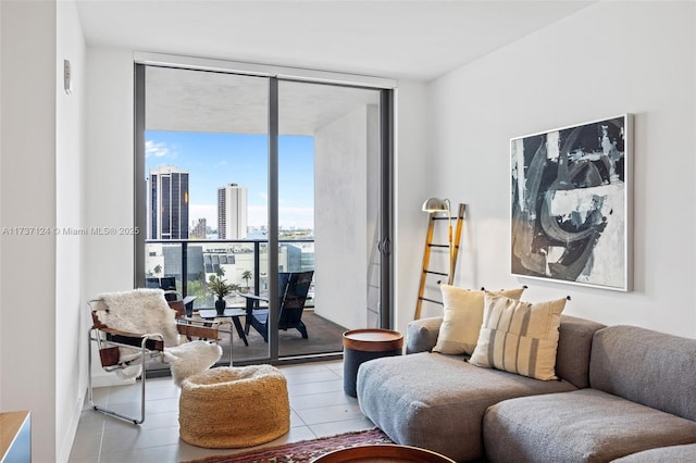 tiled living room featuring a wall of windows