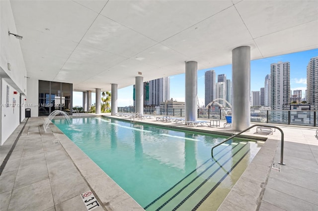 view of pool featuring a patio area